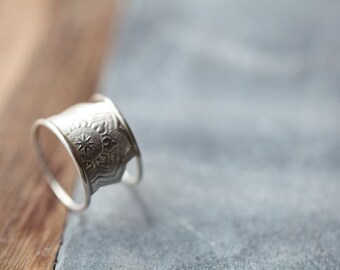 Folium ring. Sterling silver wide band. Roller Printed Jewelry