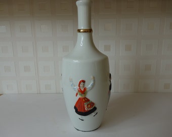 Potuguese Wine bottle with raised revellers