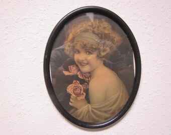 ROSES , A young girl with Pink Roses in an Oval Metal Frame with glass ** 1930s circa