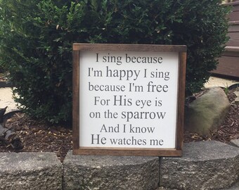 I sing because I'm happy wooden framed sign
