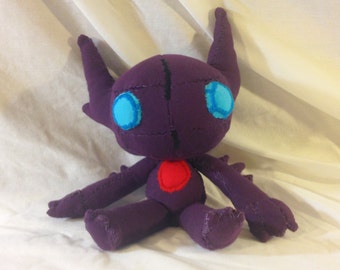 Sableye– 11 inches (about 7 sitting) – Made from recycled clothing
