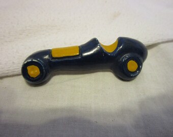 Vintage Composition Race Car Brooch