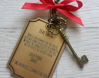 Personalised engraved magical santa key with jingle bell and ribbon