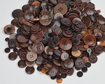25 buttons in different sizes in shades of brown