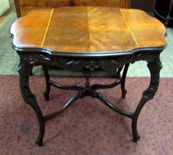 Vintage lamp table with burl wood and carved detail
