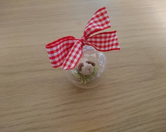 Bauble with a cute miniature Guinea pig. Guinea pig is made from Fimo.