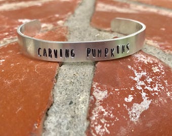 Imperfections Define Perfection or Carving Pumpkins Cuff -Aluminum