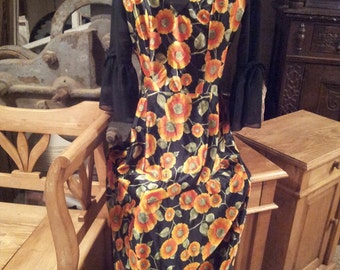 original vintage 1970s maxi dress bell sleeves floral pattern orange and black