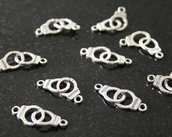 16 "cuffed" in antique silver connectors. (ref:0991).