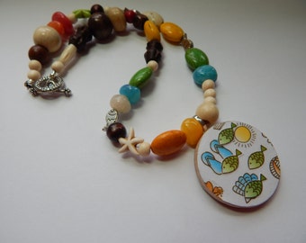 Really cute beachy one of a kind collage necklace.