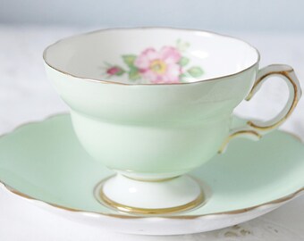 Vintage Rosina Bone China Teacup and Saucer, Light Green with Pink Rose Decor, England