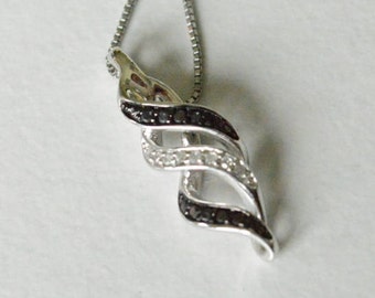 Vintage Sterling Silver Black and White Gemstone SUN Signed Infinity Swirl Necklace