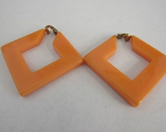 Unusual Salmon Pink Bakelite Earrings Tested