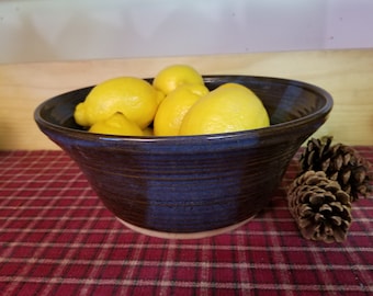Floating blue pottery bowl