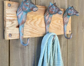 Copper and Verde Finish Cast Iron Horse Head Hooks on Solid Reclaimed Wood