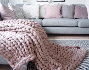 Chunky knit blanket. Premium quality merino wool. Eco and organic certified. Soft, warm and anti-allergic arm knitted throw.