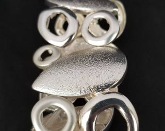 Cuff Bracelet with Satin Silver Circles and Textured Teardrop Shapes