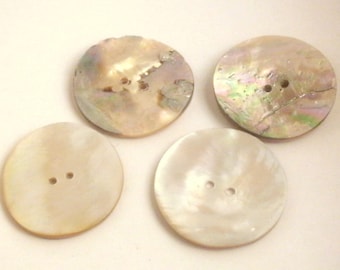 Four Round Mother of Pearl Buttons