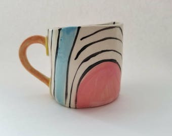 Quaint handmade slab formed stoneware linear mug