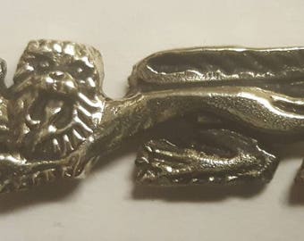 Heraldic lion solid brass badge