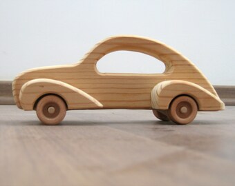 Elegant toy car made of wood