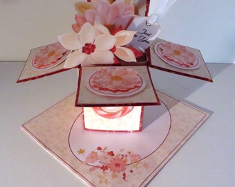 Handmade birthday popup card with flowers.