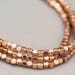 Rounded Cube Copper Spacer Beads 3mm with 1.5mm Hole 214 Beads on 24" Strand MB-52-C
