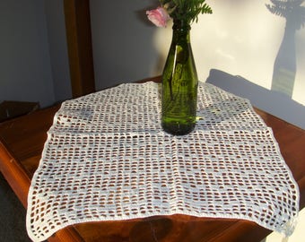 Crochet doily or table topper. 14 x 17" Vintage loose eyelet.