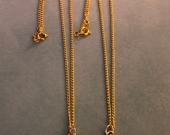 Two Gold plated shell necklaces