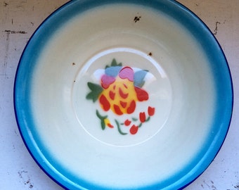 Large enamel bowl with flower decoration