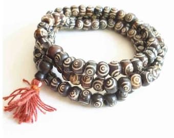 Whole necklace of 108 beads in 8 yak bone hand carved mala 9 mm