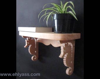 Solid wood by Ehlyass seahorse wall shelf