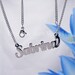 Sabrina name necklaces. stainless steel. next day ship. never tarnishes. shiny silver color