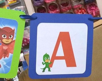 Festoon PJ Masks Superpajamas in cardboard with written your name and with tape included