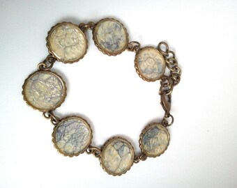 This bracelet seven links paint and resin