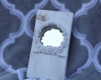 Petite salvage wood mirror.