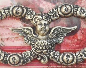 Floral brass centerpiece with cherub, Brass Ox, Brass Stampings Made in the USA