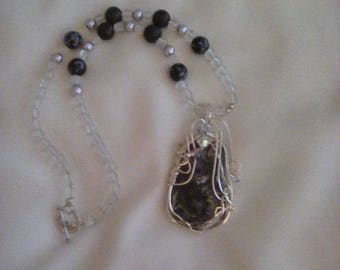 Silverstone wirewrapped black ocean shell