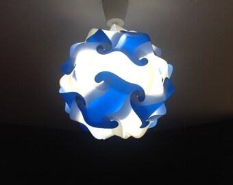 Light blue and white lamp sphere puzzle