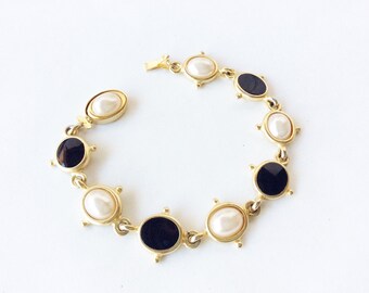 E. Pearl bracelet designer signed pearls cabochon and black cabochon link bracelet