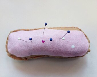 Pin cushion. Strawberry eclair.
