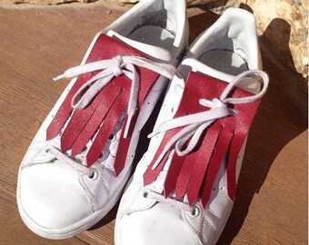 Removable raspberry red leather fringe/tabs