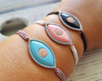 Micro pave Cubic zirconia evil eye bracelet.Light blue,pink,black.Gold plated.Protective.Good luck.Luxury.