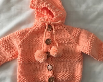 Creamsicle orange hooded sweater, size 6 months.