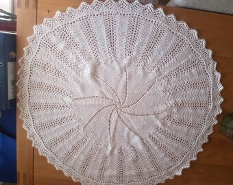 Hand knitted baby circular shawl