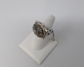 Dian Malouf limited edition fossilized sand dollar ring