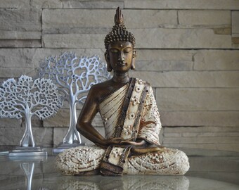 Sculpture de Bouddha en résine finition bronze-crème, fait à la main à Bali. Visitez notre nouvelle boutique Etsy !