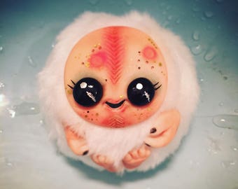 Smiling white Monster Christmas ornament