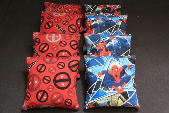 Cornhole bean backs for a fun game of Spiderman vs. Deadpool, anyone??