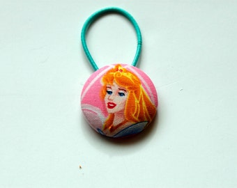 Sleeping Beauty Fabric Covered Giant Button Ponytail Holder